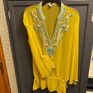 Sheer Beaded v-neck and sleeve pool coverup.  Drawstring at hip.